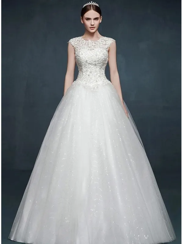 Abito da Sposa 2016 con gonna glitterata brillante e corpetto accollato di pizzo