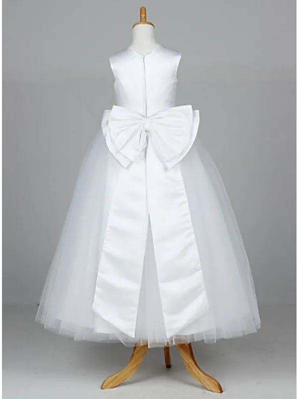 Abito per la prima comunione bianco semplice con gonna vaporosa in tulle